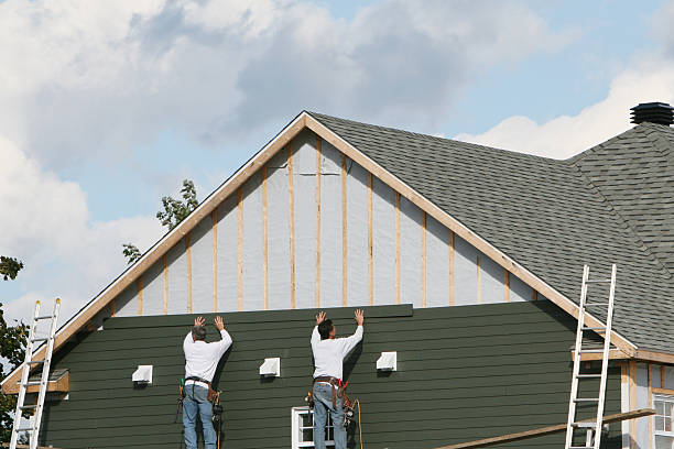 Professional Siding Installation technician working in Portage, PA